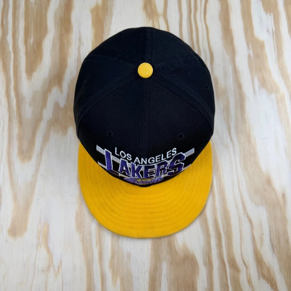 New Era 9FIFTY Los Angeles Lakers Youth Snapback‎ Hat Black Yellow NBA HWC Cap